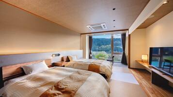 Chambre Supérieure avec lits jumeaux | Coffres-forts dans les chambres, fer et planche à repasser