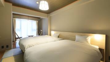Standard Room -60 sqm with 4 Beds | WiFi (free), bed sheets