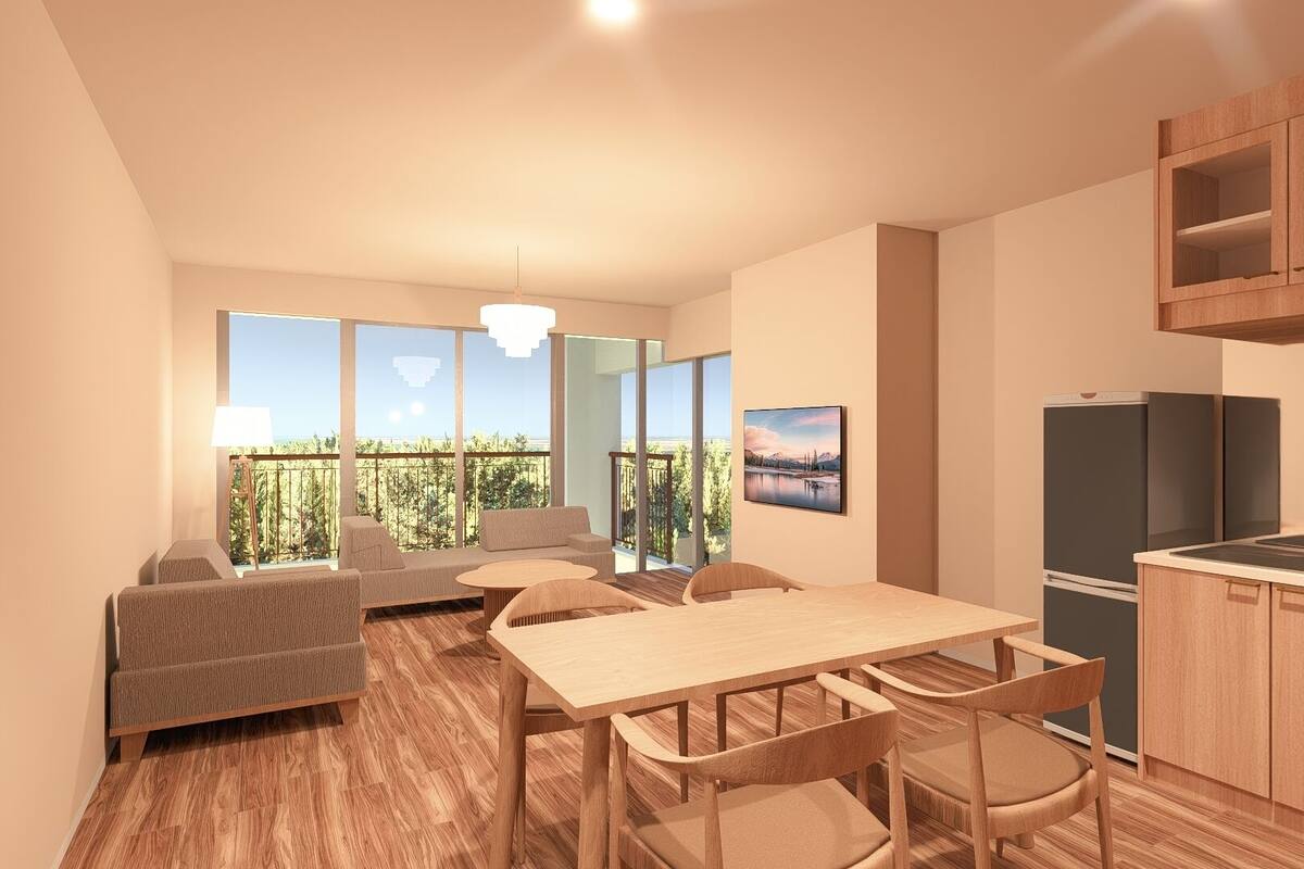 A modern kitchen with wooden cabinets, a built-in refrigerator, and a sink.