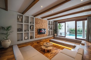 Villa Luxe, 4 chambres, non-fumeurs, piscine privée | Coin séjour | Console de jeux vidéo