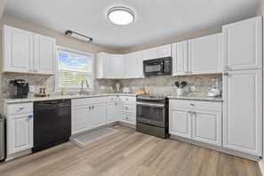 Fridge, microwave, dishwasher, coffee/tea maker