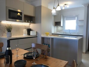 Fridge, microwave, oven, coffee/tea maker