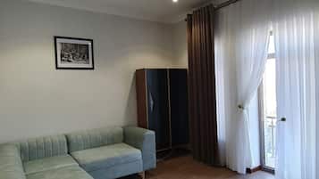Luxury Suite, Balcony, Hill View | In-room safe, desk, laptop workspace, blackout drapes