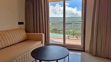 Habitación doble Deluxe | Sala de estar