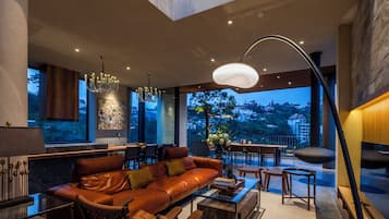 Presidential Apartment | Living area | 36-inch flat-screen TV with cable channels