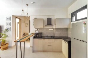 Apartamento, sacada | Cozinha privada