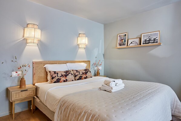 Apartment | Laptop workspace, iron/ironing board, bed sheets