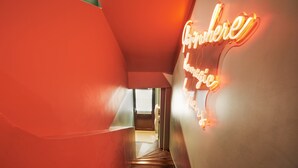 A modern interior with a neon sign reading "Where to stay." - Charming Studio Center of Paris With AC (Paris)