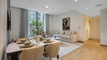 Apartamento superluxo, varanda | Área de estar