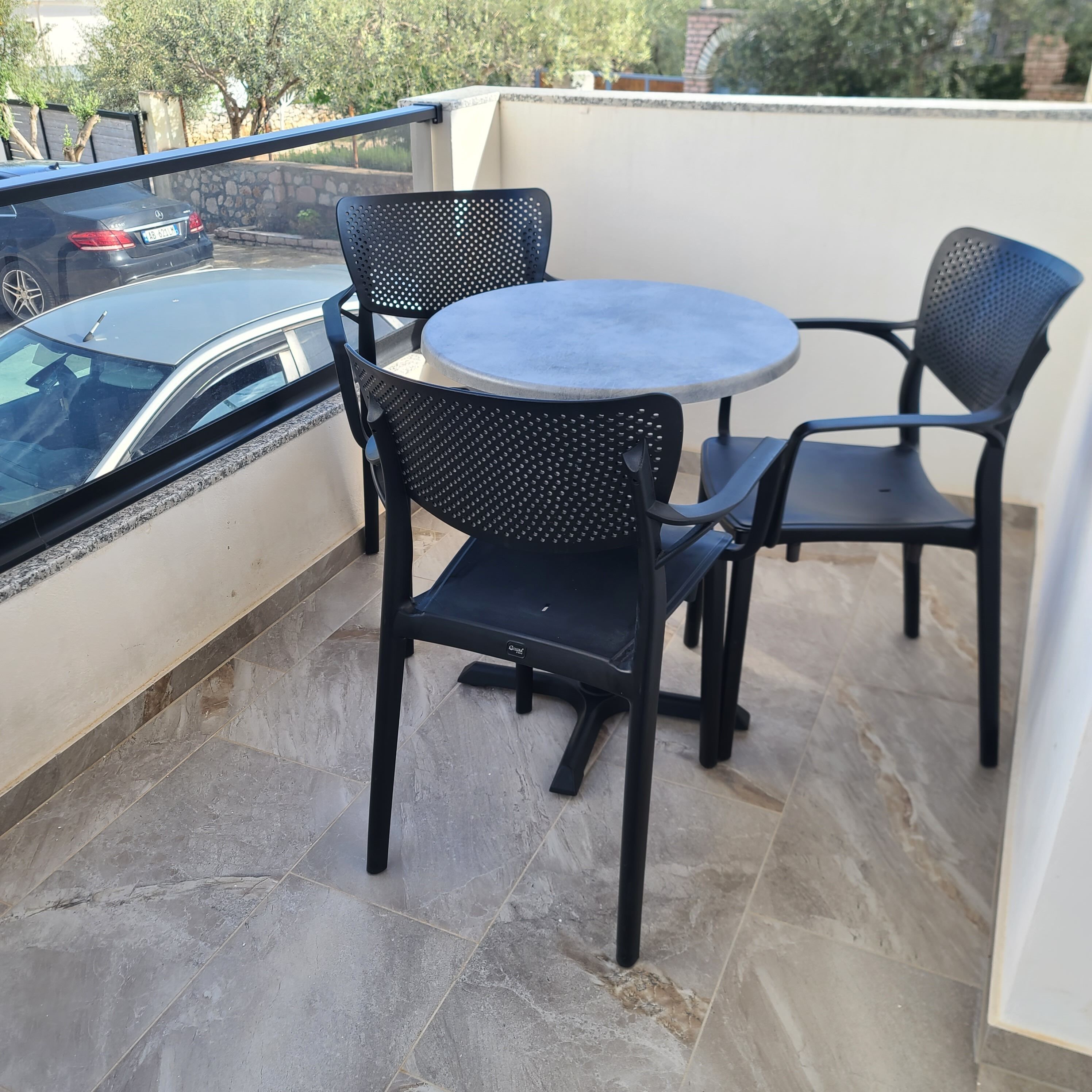 Deluxe-Dreibettzimmer, Balkon, Stadtblick | Terrasse/Patio