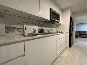 Fridge, microwave, coffee/tea maker, toaster