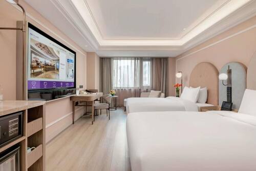 Habitación Deluxe, 2 camas individuales | Minibar con artículos gratuitos y escritorio