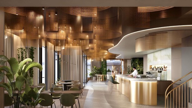 Un hall d’hôtel moderne avec un comptoir d’accueil incurvé, des espaces de détente et un escalier.