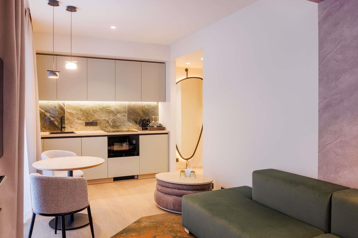 Family Apartment, 1 Bedroom | Minibar, in-room safe, desk, blackout drapes