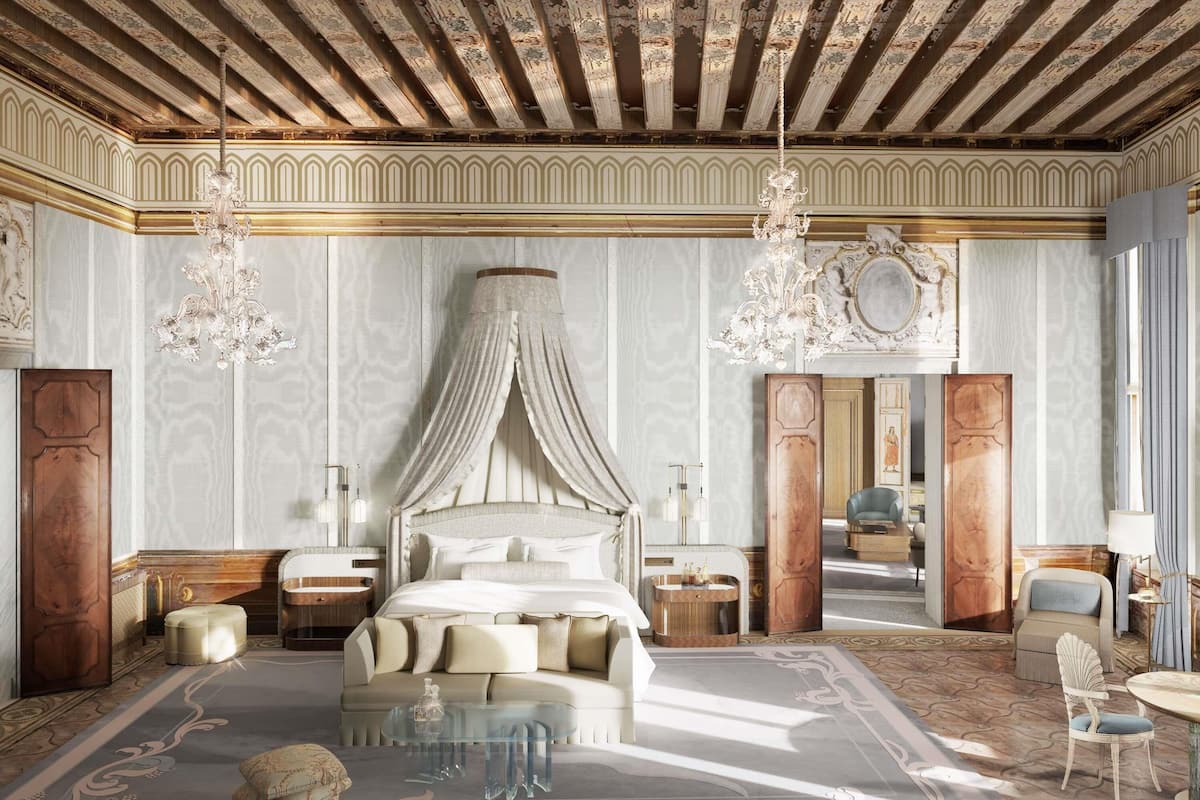 A luxurious bedroom with a four-poster bed, ornate ceiling, and classic decor.
