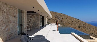 Earthy Architecture Meets Endless Blue by etouri