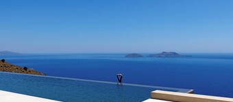 Earthy Architecture Meets Endless Blue by etouri