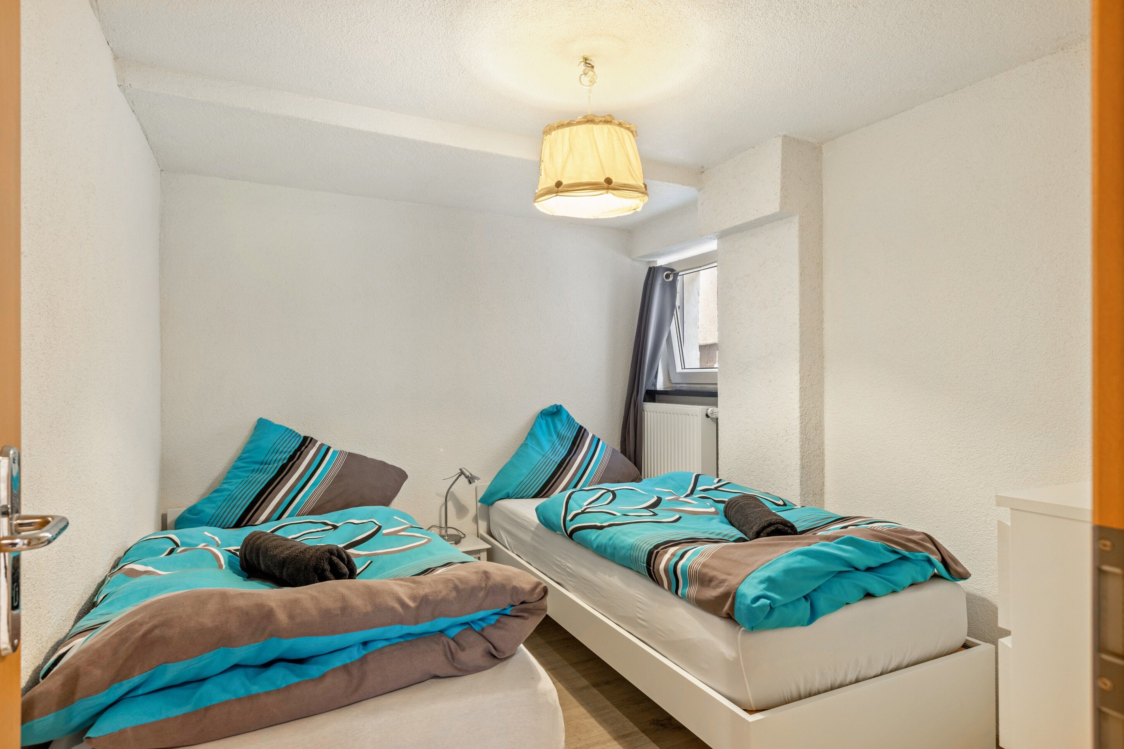 2 slaapkamers, een strijkplank/strijkijzer, wifi, beddengoed