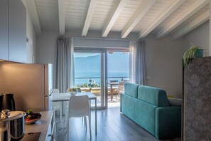 Apartment, Balcony, Lake View | Living area | TV - Relais Zenner (Toscolano Maderno)