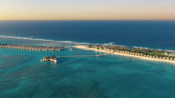 An aerial view of a resort with overwater bungalows, a pier, and a beach. - Meyyafushi Maldives - Premium All Inclusive (Meyyafushi)