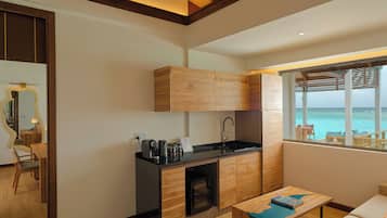 Two Bedroom Water Pool Villa with Slide | Free minibar items, in-room safe, desk, iron/ironing board