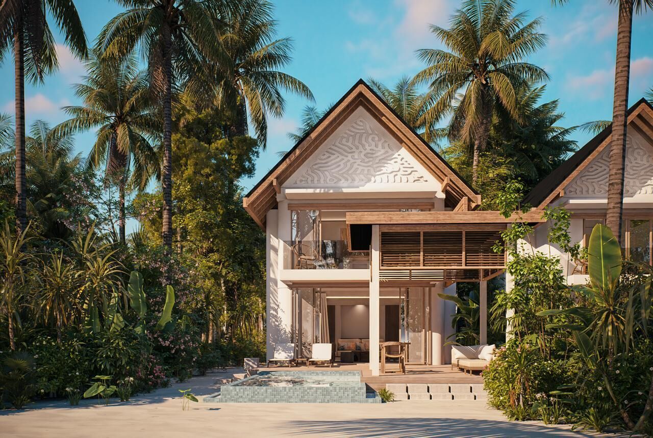 A modern resort with a pool, outdoor seating, and tropical vegetation.