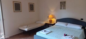 Family Triple Room, Balcony, Garden View | Free WiFi