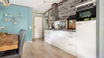 Fridge, stovetop, dishwasher, coffee/tea maker