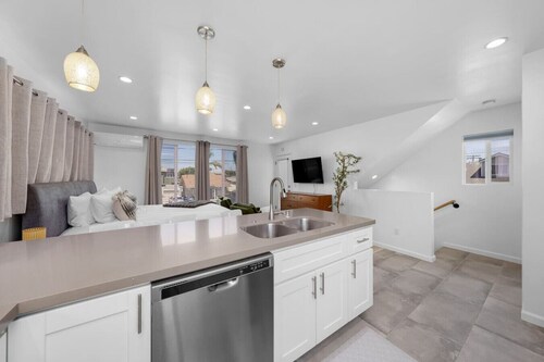 Modern Urban Escape w/ Rooftop & Walkable Fun
