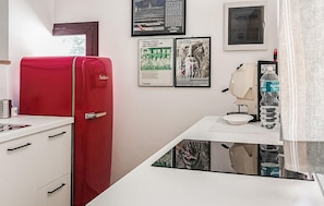 Fridge, coffee/tea maker, cookware/dishes/utensils