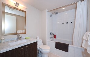 Hair dryer, towels, soap, toilet paper