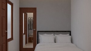 A bedroom with a bed, a wardrobe, and a mirror. - Samara Stay by Sinergi (Semarang)