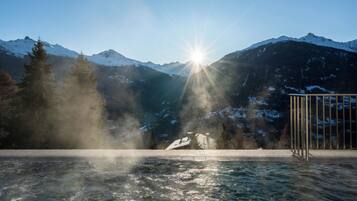 Outdoor pool, open 9:00 AM to 9:00 PM, pool loungers