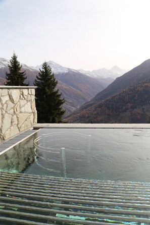 Outdoor pool, open 10:00 AM to 8:00 PM, sun loungers