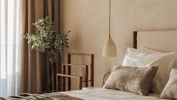 Deluxe Suite, Sea View | In-room safe, blackout drapes, soundproofing, iron/ironing board