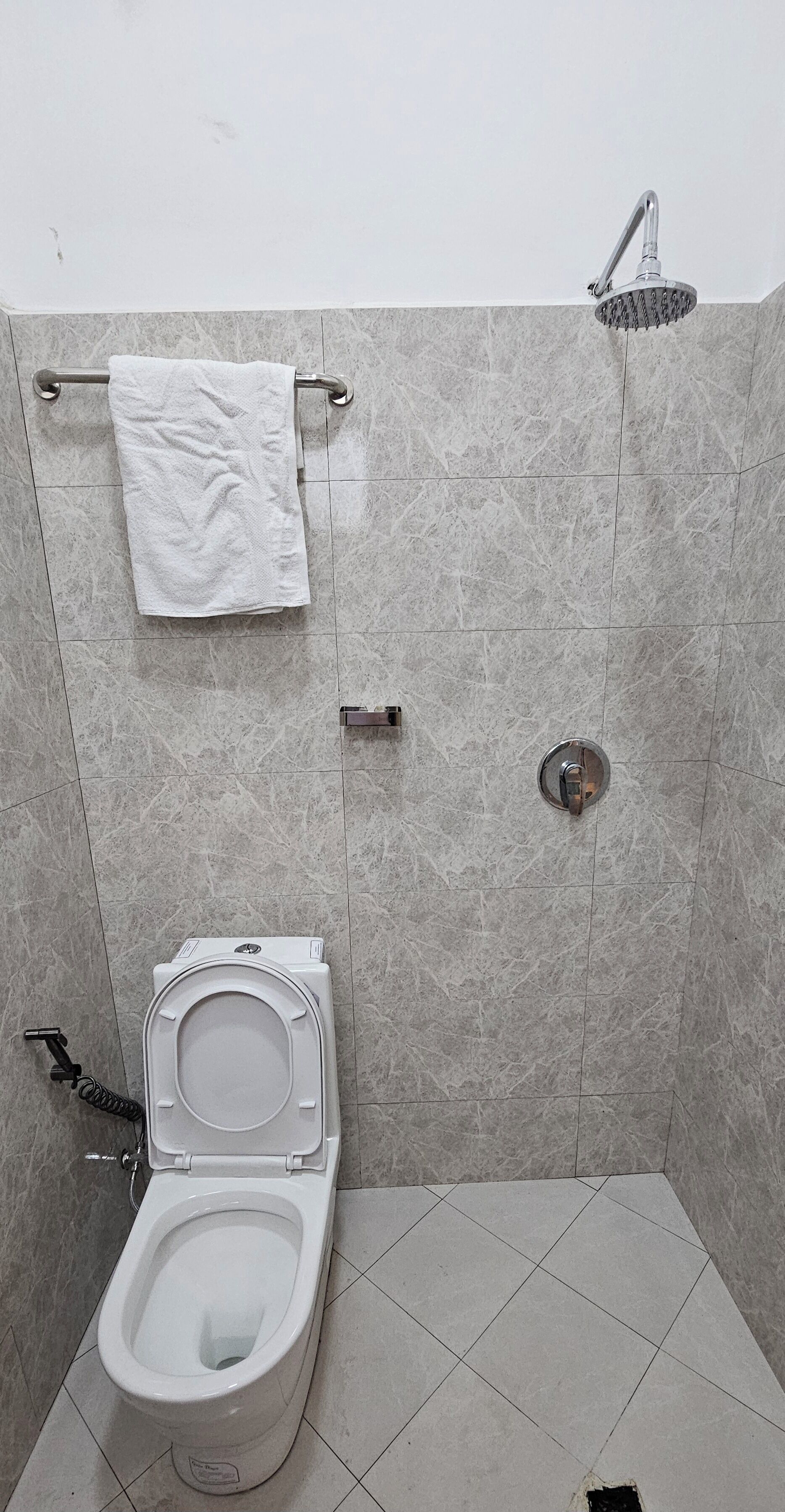 Slippers, towels, soap, toilet paper