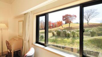 Deluxe Twin Room, Garden View | Blackout drapes, iron/ironing board, free WiFi