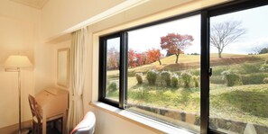 Deluxe Twin Room, Garden View | Blackout drapes, iron/ironing board, free WiFi