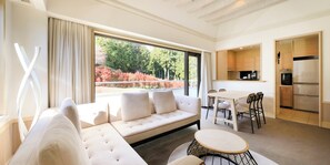 Suite | Down comforters, desk, laptop workspace, blackout drapes