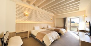 Suite | Down comforters, desk, laptop workspace, blackout drapes