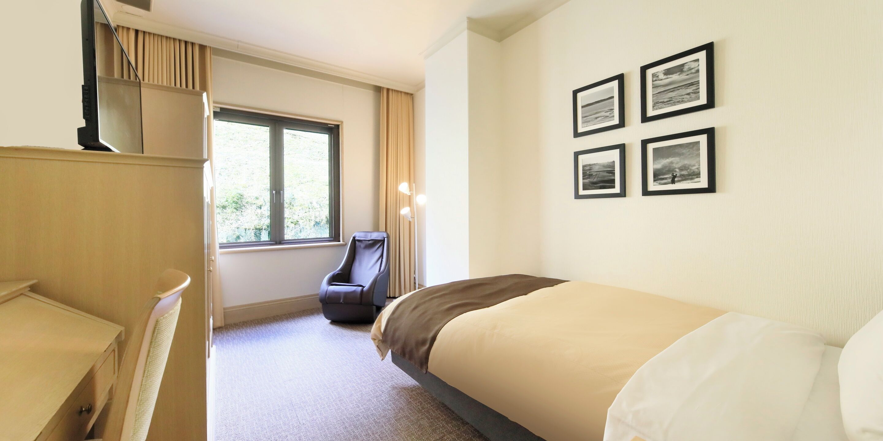 Habitación individual Deluxe | Edredones de plumas, escritorio, espacio para trabajar con un portátil