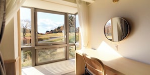 Suite | Down comforters, desk, laptop workspace, blackout drapes