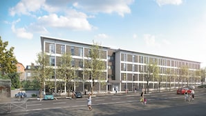 A modern building with a flat roof, large windows, and a mix of brick and concrete exterior. - Student Factory Nancy Centre (Nancy)