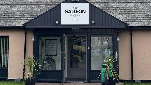 A building with a sign reading "The Galleon Hotel Hull" and a reception area with glass doors. - The Galleon Hotel, Hull City, Part of the AG Collection (Hull)