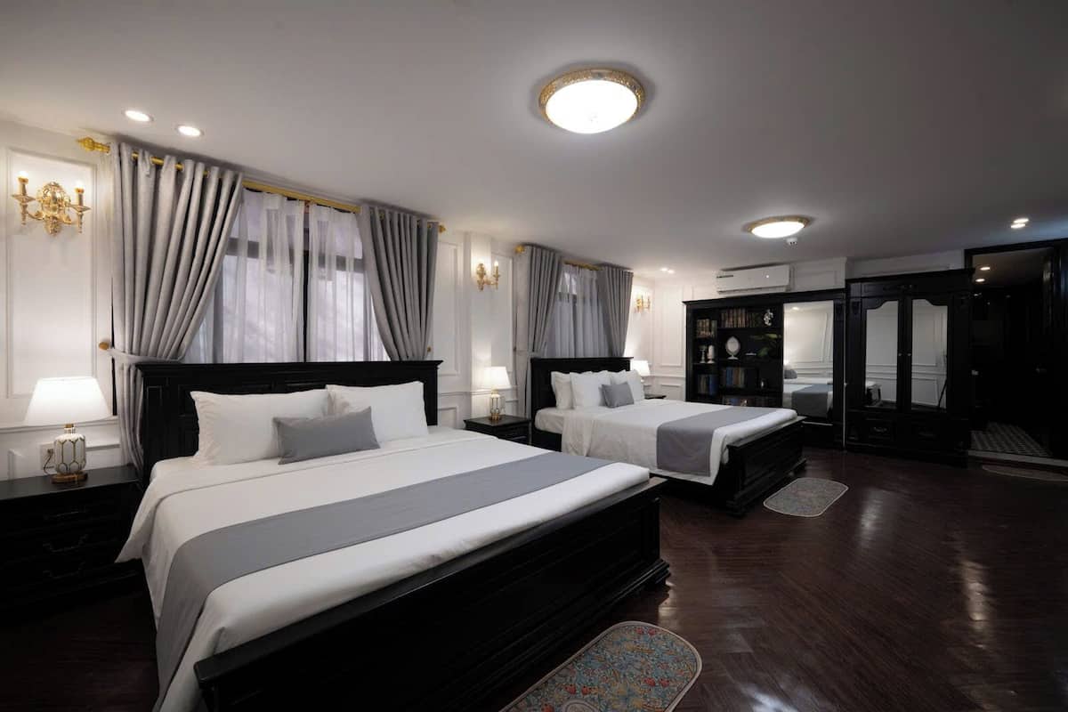 Deluxe Quadruple Room, City View | Desk, laptop workspace, soundproofing, free WiFi