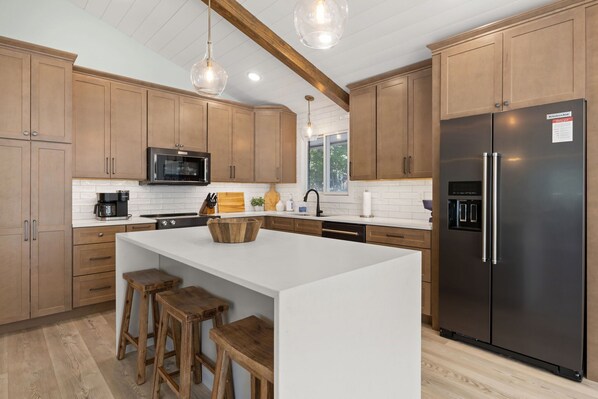 Fridge, microwave, oven, stovetop - Lakefront Home Salt Water Pool & Private Dock (Sunrise Beach)