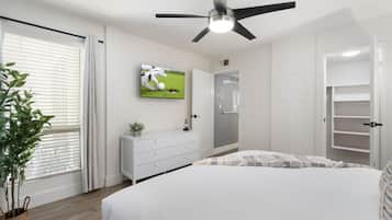 1 bedroom, desk, iron/ironing board, travel crib