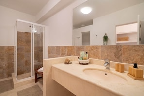 Shower, hair dryer, towels, soap