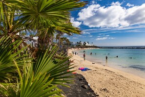 On the beach, beach towels