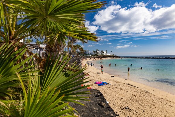 On the beach, beach towels